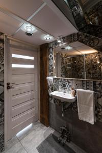 Ένα μπάνιο στο Noble Apartment & Sauna ZONE