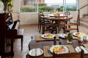 Restoran ili drugo mesto za obedovanje u objektu Aire del Mar Guest House