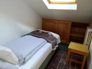 A bed or beds in a room at Chalet Stelvio