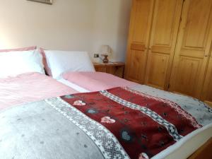 A bed or beds in a room at Chalet Stelvio