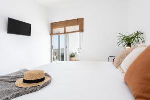 Ένα ή περισσότερα κρεβάτια σε δωμάτιο στο Playachica sea view apartment