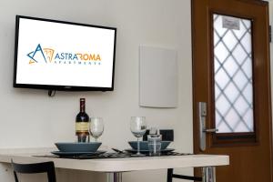 Μια τηλεόραση ή/και κέντρο ψυχαγωγίας στο Astra Roma Apartments