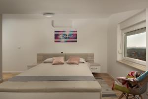 Postel nebo postele na pokoji v ubytování Apartment AleMar