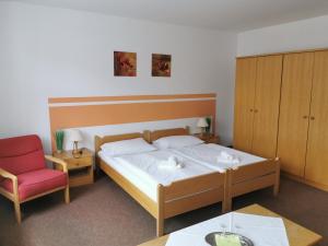 Cama ou camas em um quarto em Harzbaude - Pension Gasthaus Bodetal