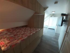 Postel nebo postele na pokoji v ubytování B&B De Kaagse Boer