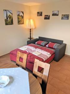 Postel nebo postele na pokoji v ubytování Ubytování ve Vinařství Medek | Medek House & Winery