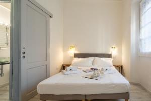 Posteľ alebo postele v izbe v ubytovaní Central Station Apartment by Mmega