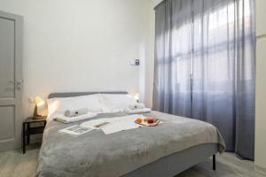 Posteľ alebo postele v izbe v ubytovaní Central Station Apartment by Mmega