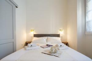 Posteľ alebo postele v izbe v ubytovaní Central Station Apartment by Mmega