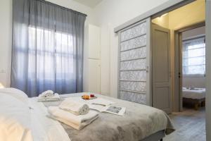 Posteľ alebo postele v izbe v ubytovaní Central Station Apartment by Mmega