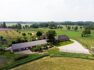 an aerial view of a farm with a barn at Bed & Breakfast El Manso in Emst