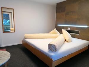 Kama o mga kama sa kuwarto sa Hotel Eden