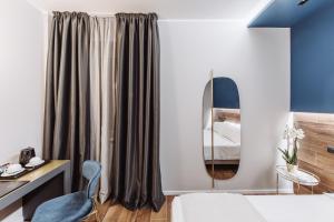 Postel nebo postele na pokoji v ubytování Hotel Europa