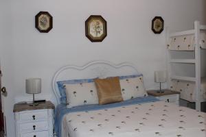 Uma cama ou camas num quarto em Casa Sousa