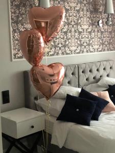 Posteľ alebo postele v izbe v ubytovaní Apartament Luksusowy z sauną