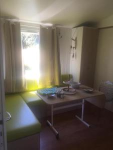 Posezení v ubytování Mobil home climatisé, bord de mer Macinaggio