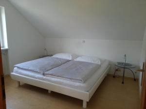 Postel nebo postele na pokoji v ubytování Appartement Feldkirch
