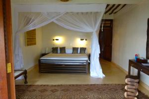 Postel nebo postele na pokoji v ubytování Peponi Hotel Lamu - Kenya