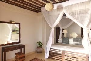 Postel nebo postele na pokoji v ubytování Peponi Hotel Lamu - Kenya
