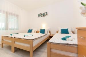 Postel nebo postele na pokoji v ubytování Studio apartman Branka