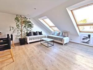 Posezení v ubytování Lieblingsplatz Neusiedl Appartement - Erhol dich gut