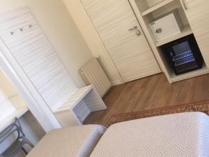 TV a/nebo společenská místnost v ubytování Hotel La Nuova Rotaia