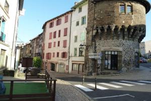 an old building on the side of a street at STUDIO 1 personne dans le centre historique in Le Puy-en-Velay