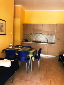 Kjøkken eller kjøkkenkrok på Giardino - Poggio del Casale - Affittacamere - landlords