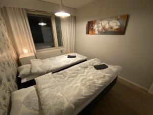 Postel nebo postele na pokoji v ubytování Holiday Home Sodankylä