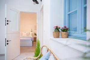 Łóżko lub łóżka w pokoju w obiekcie Apartamento Cádiz Centro Blue Window