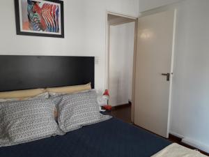 Postel nebo postele na pokoji v ubytování Apartamento Avenida de Mayo 1316