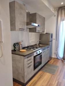 A kitchen or kitchenette at Sevi modern stay
