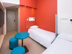 ibis budget Medellín Itagüí Metro客房内的一张或多张床位