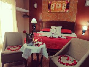 Postel nebo postele na pokoji v ubytování Hotel Mayahau Coba