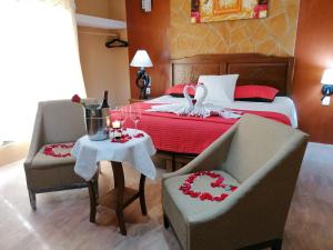 Postel nebo postele na pokoji v ubytování Hotel Mayahau Coba