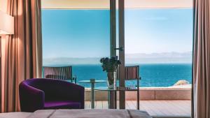 a hotel room with a view of the ocean at ON'LIVE HOTEL in Çeşme