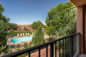 a view of a pool from a balcony at Holiday Inn Canyon De Chelly-Chinle by IHG in Chinle