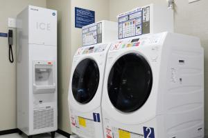 a washing machine and a dryer in a store at Daiwa Roynet Hotel Nara Natural Hot Spring in Nara +112 photos
