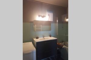 Giường trong phòng chung tại Le Solidor vue mer