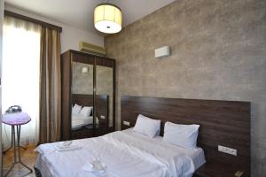 Cama o camas de una habitación en Freedom Apartment on Nalbandyan street