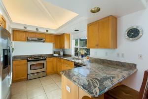 Η κουζίνα ή μικρή κουζίνα στο Villas of Kamalii 47 home +10 φωτογραφίες