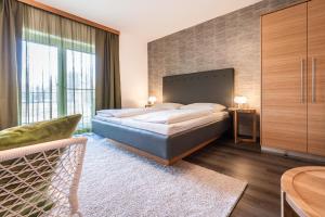 Postel nebo postele na pokoji v ubytování Hotel Birkenhof