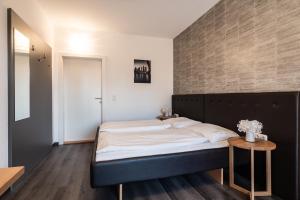 Postel nebo postele na pokoji v ubytování Hotel Birkenhof