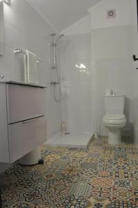 Vonios kambarys apgyvendinimo įstaigoje SUN & SAND GUESTHOUSE