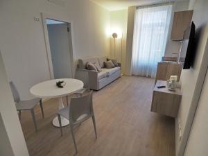 TV a/nebo společenská místnost v ubytování Albergo Accademia
