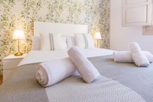 Posteľ alebo postele v izbe v ubytovaní Mitjana by ELE Apartments