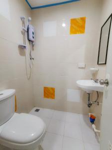 Koupelna v ubytování Downtown Suites