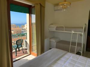 Postel nebo postele na pokoji v ubytování Hotel La Margherita & SPA