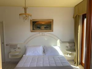 Postel nebo postele na pokoji v ubytování Hotel La Margherita & SPA