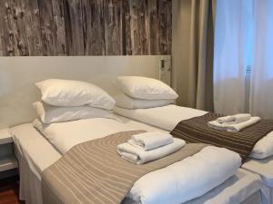 Ένα ή περισσότερα κρεβάτια σε δωμάτιο στο Panorama Rorbusuiter